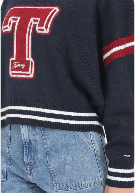 Women's blue V-neck sweater with an oversized college style cut TOMMY JEANS | DW0DW18519C1GC1G